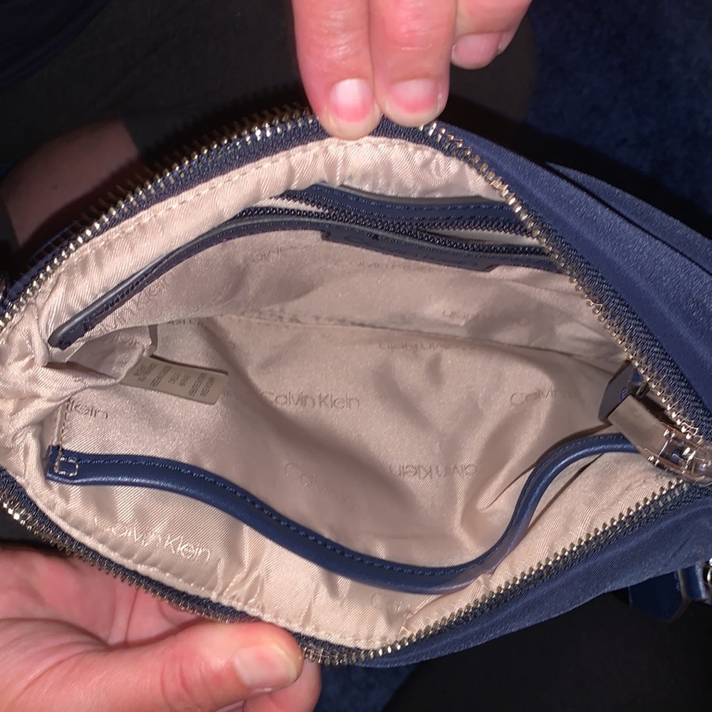 Calvin Klein navy blue purse/ like new/ adjustable strap. Lots of pockets! - Picture 3 of 3